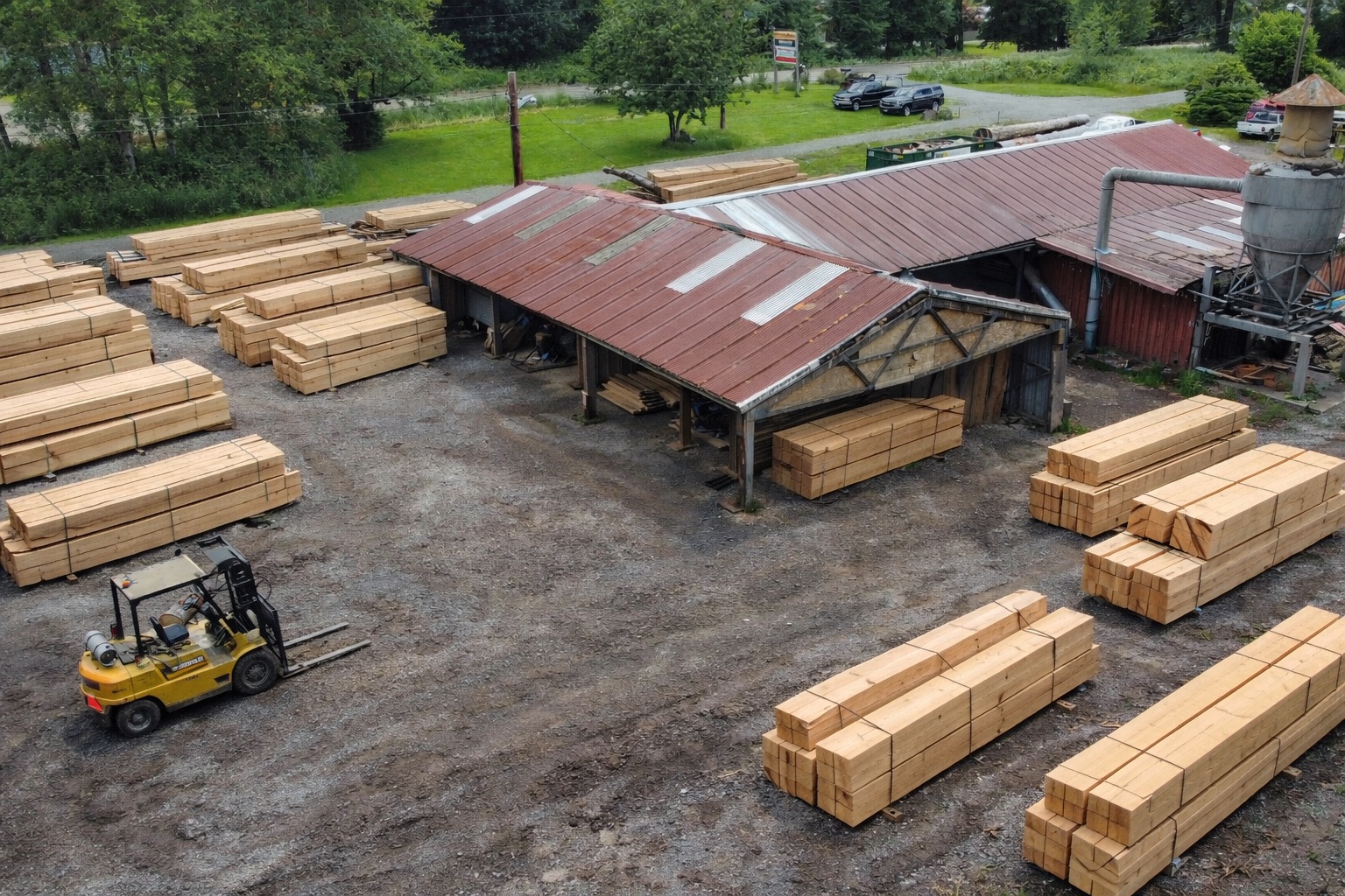 Washington Timber Company mill yard with Douglas Fir timber stacks, Arlington WA