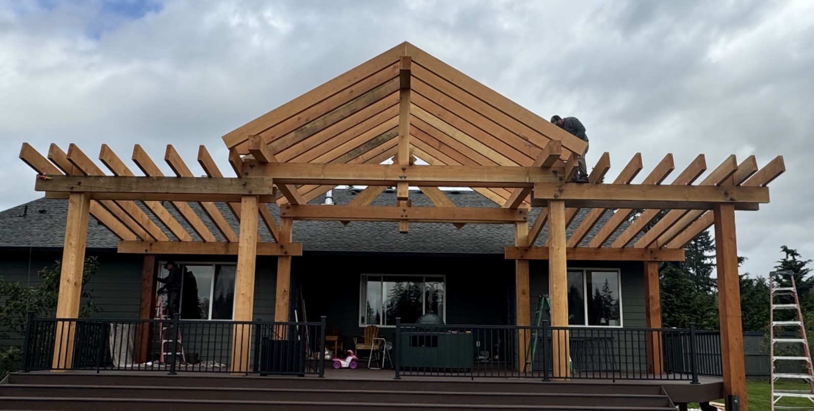 Residential timber pergola covering an outdoor deck
